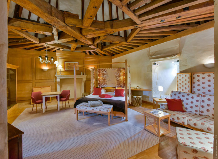 Chambre lit double poutres apparentes