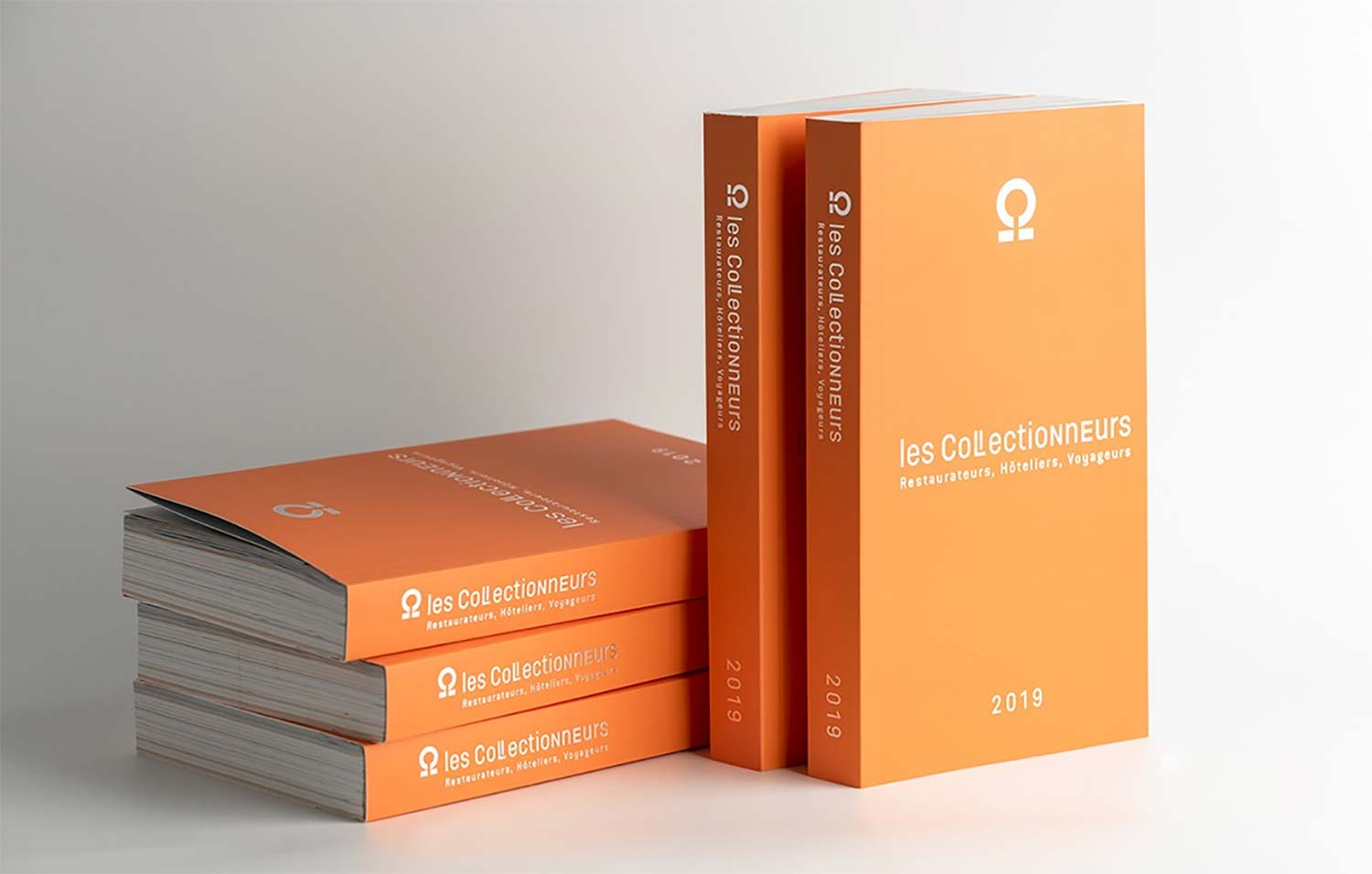 Guide orange, inscription " les Collectionneurs - Restaurateurs, hôteliers, voyageurs - 2019